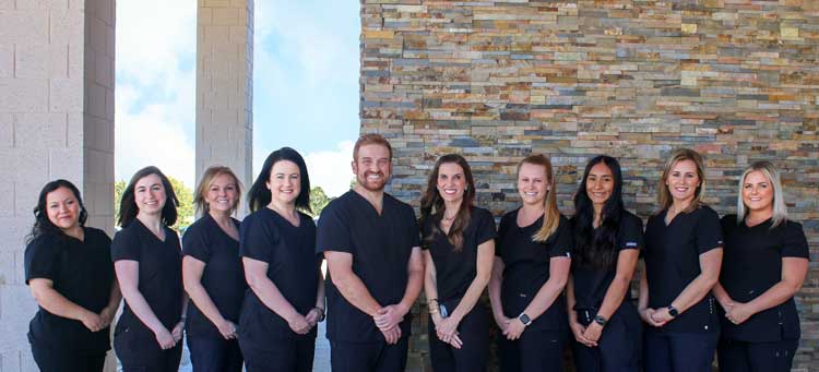 A team photo of a dental team in Rockwall, TX